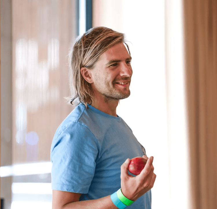 Charlie Ellington enjoying an apple